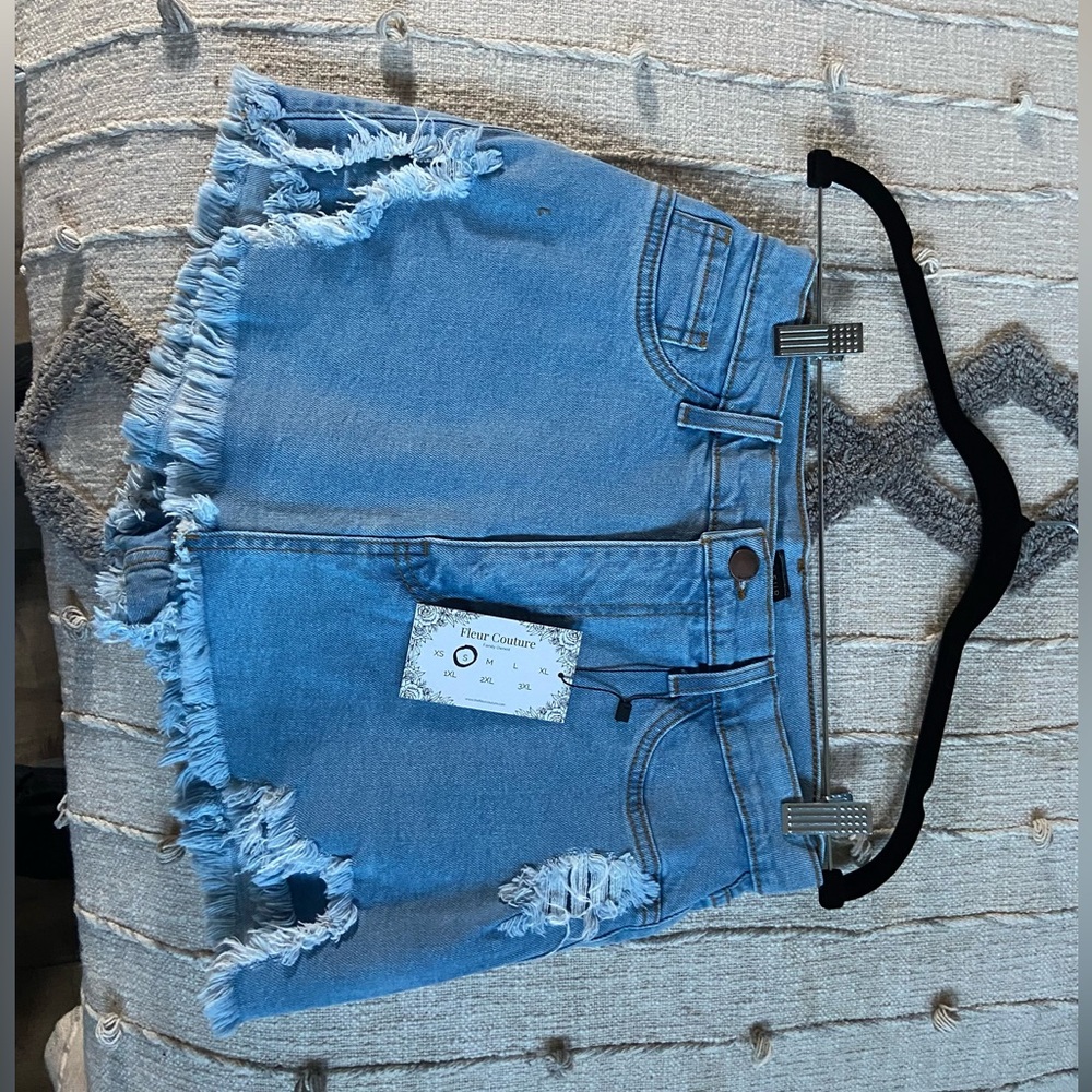 Brand New Women’s Jean Skirt With Built In Shorts Size S.